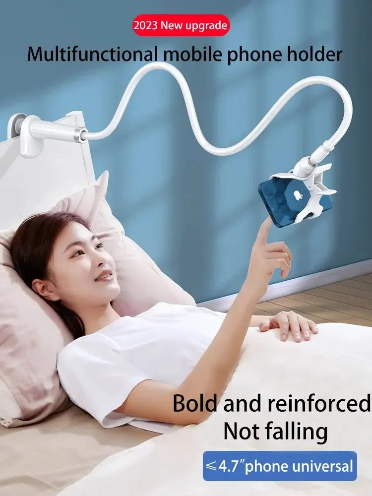 A woman is using a multifunctional mobile phone holder with a flexible gooseneck to hold her phone while lying in bed.