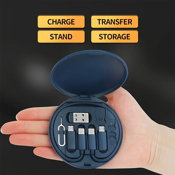 Una mano sostiene un adaptador de carga azul abierto con múltiples puertos y botones de función etiquetados como Cargar, Tran
