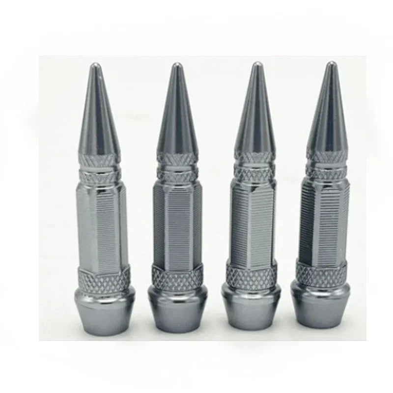 A set of five silver universal bullet head screws for tires and valves shown in a row.