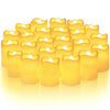A collection of twelve glowing yellow LED tea lights with flickering flames arranged in a row.