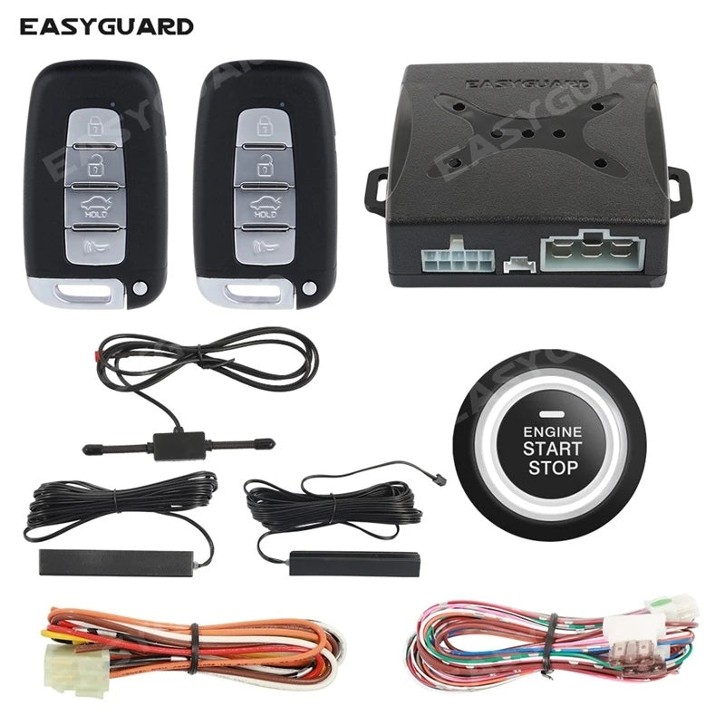 A set of keyless entry components including a remote, push button, and various wiring harnesses for an ignition system.