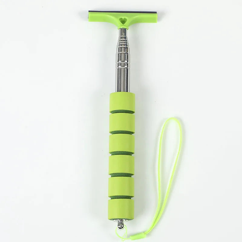 A lime green retractable car mirror and window cleaning wiper with a flexible cord.