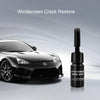 A bottle of windshield crack restore resin next to a black Lexus sports car.