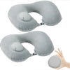 A gray self-inflating travel neck pillow with a soft flocking cover shown in two views.