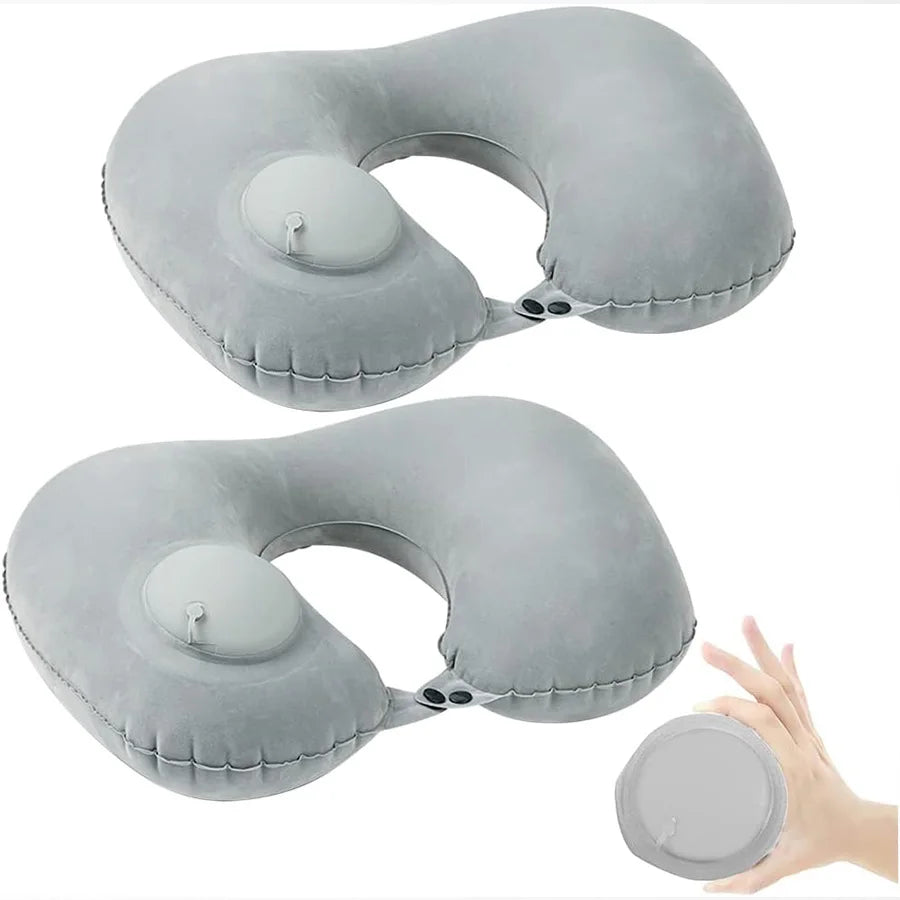 A gray self-inflating travel neck pillow with a soft flocking cover shown in two views.