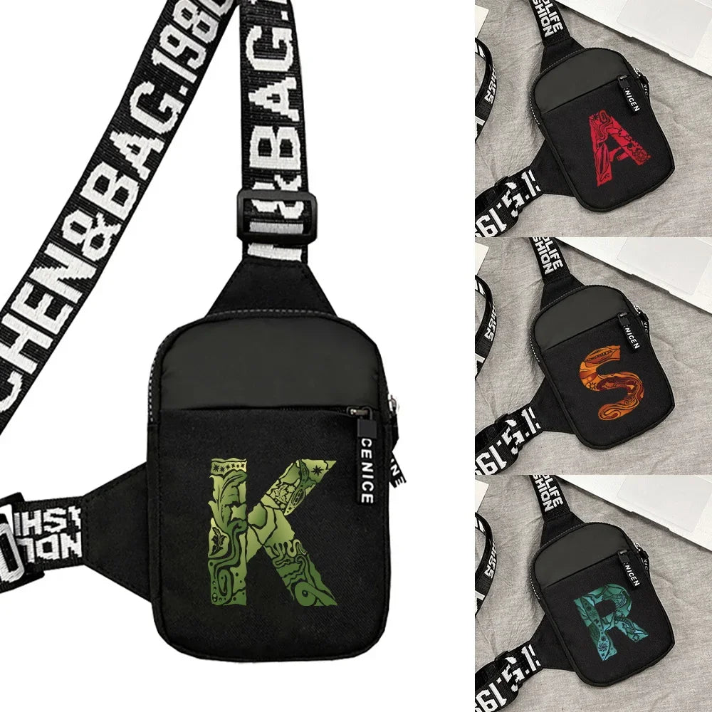 Black canvas chest bag with an embroidered green letter K and black strap