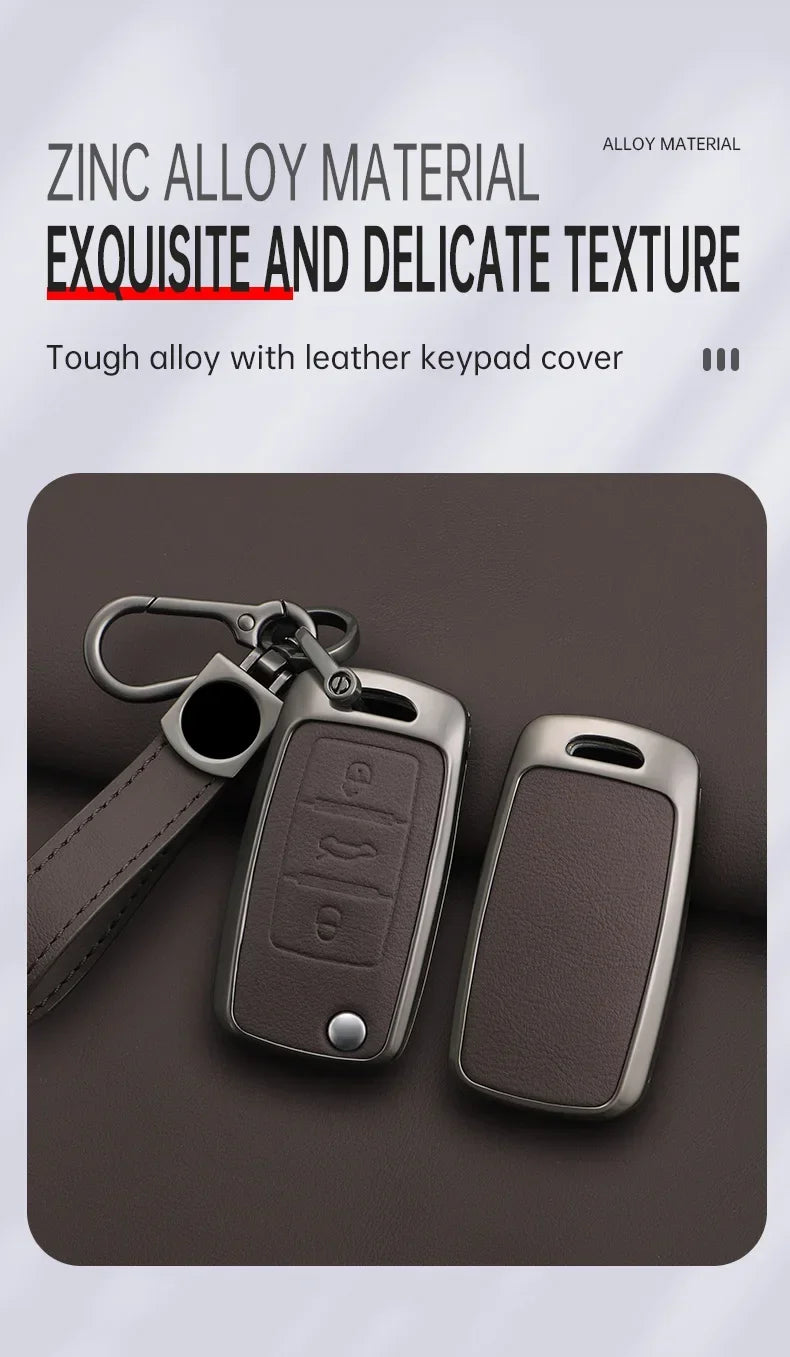 A close-up of a dark brown zinc alloy car key case cover with a leather strap and metal clip.