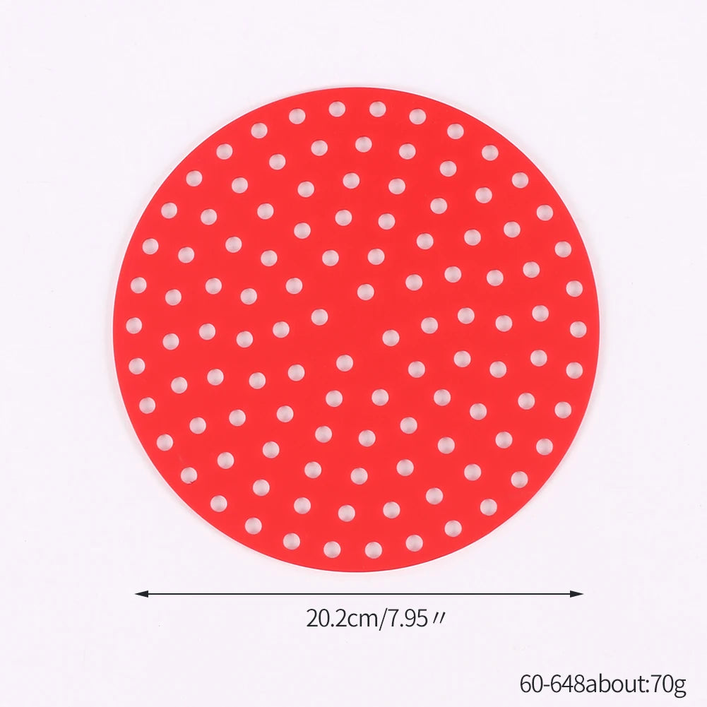 Red silicone air fryer liner with evenly spaced white dots