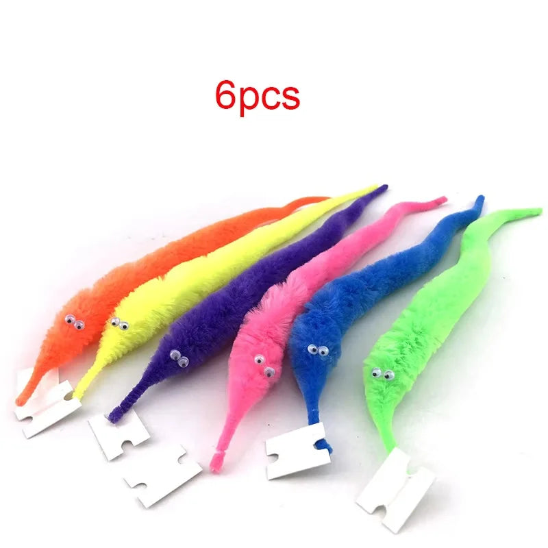 Six pieces of colorful magic trick props including a bag and flower for beginner magic tricks