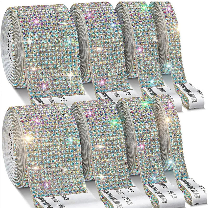 Rolls of crystal rhinestone ribbon stickers for DIY decoration in various shades of gold and silver.