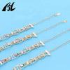 Symbolic Charm Bracelet with Elephant, Horseshoe & Evil Eye Pendants