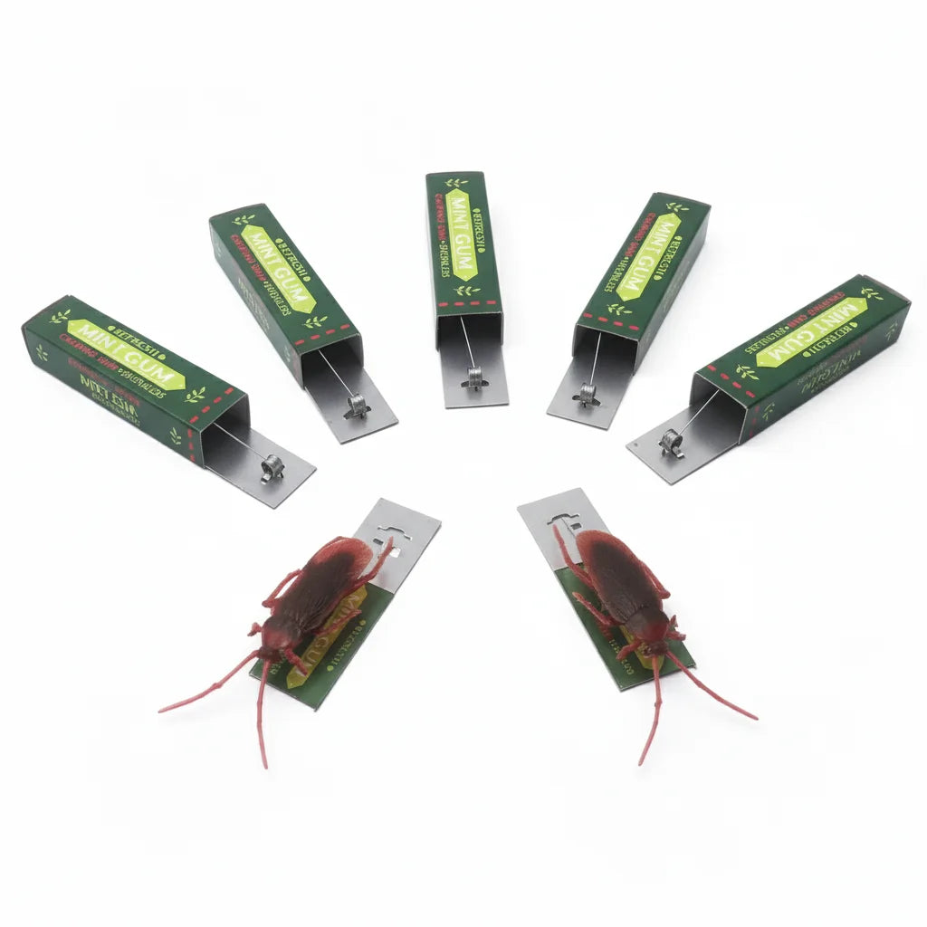 A set of realistic cockroach prank gum toys in green packaging and cardboard holders.