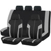 A set of nine black and gray car seat covers displayed in a row.