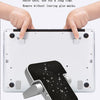 A white aluminum portable laptop stand is shown being used to hold a laptop, demonstrating its traceless glue feature.