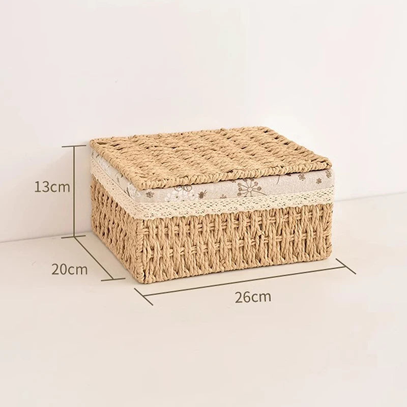 A rectangular handwoven rattan storage basket with a lid, showing dimensions of 20cm by 26cm and height of 13cm.