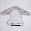 Long-sleeve waterproof baby bibs featuring a light patterned fabric with blue and orange animal designs.
