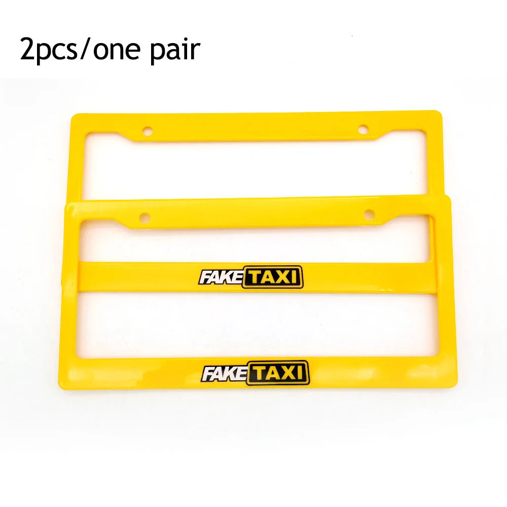 A pair of yellow racing style license plate frames with fake taxi text.