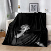 A black throw blanket featuring a portrait of Eminem and 2Pac in dramatic lighting.