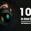 A person holds a camera lens, with text overlay stating 100% In-kind Shooting for a JDM-Style Eagle Beak Clasp Keychain.