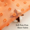 Orange pom-pom sheer fabric with a 3D jacquard rod pocket