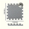 Gray interlocking EVA foam exercise mat with textured surface and visible thickness measurement