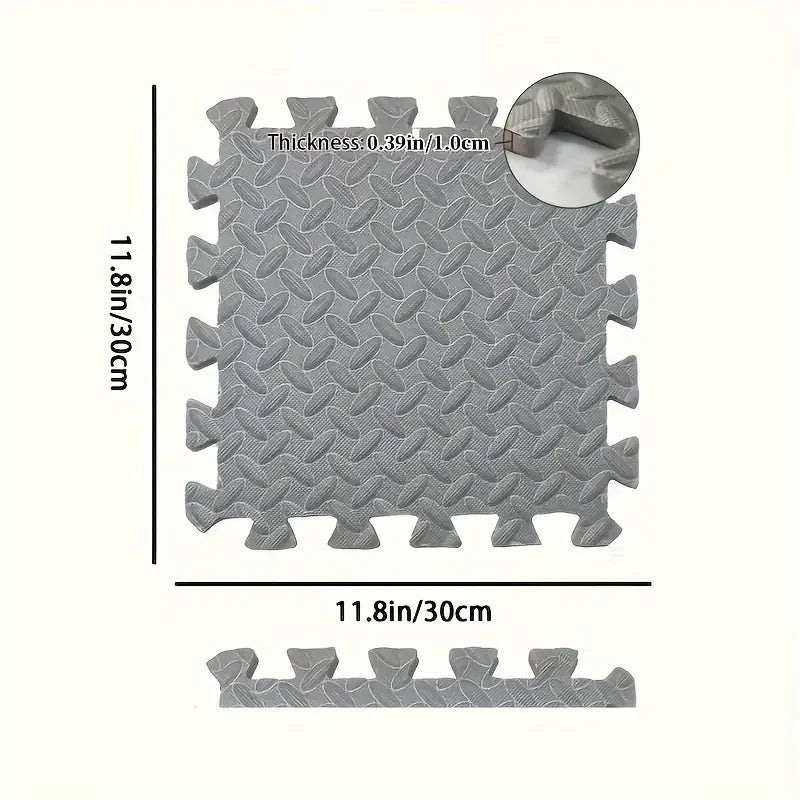 Gray interlocking EVA foam exercise mat with textured surface and visible thickness measurement