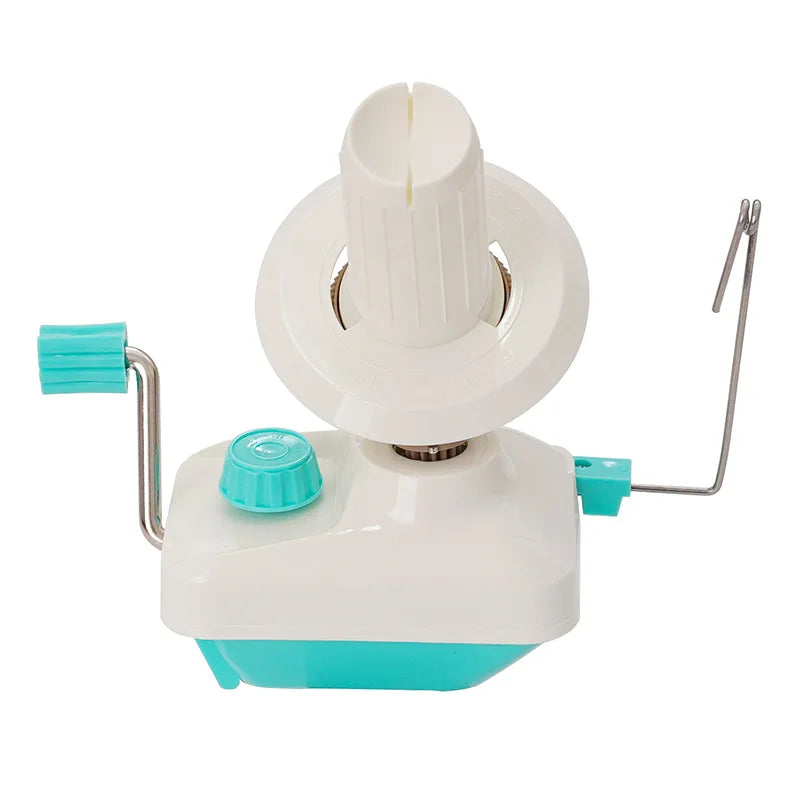 A white hand-operated yarn ball winder with a teal base and a metal handle.