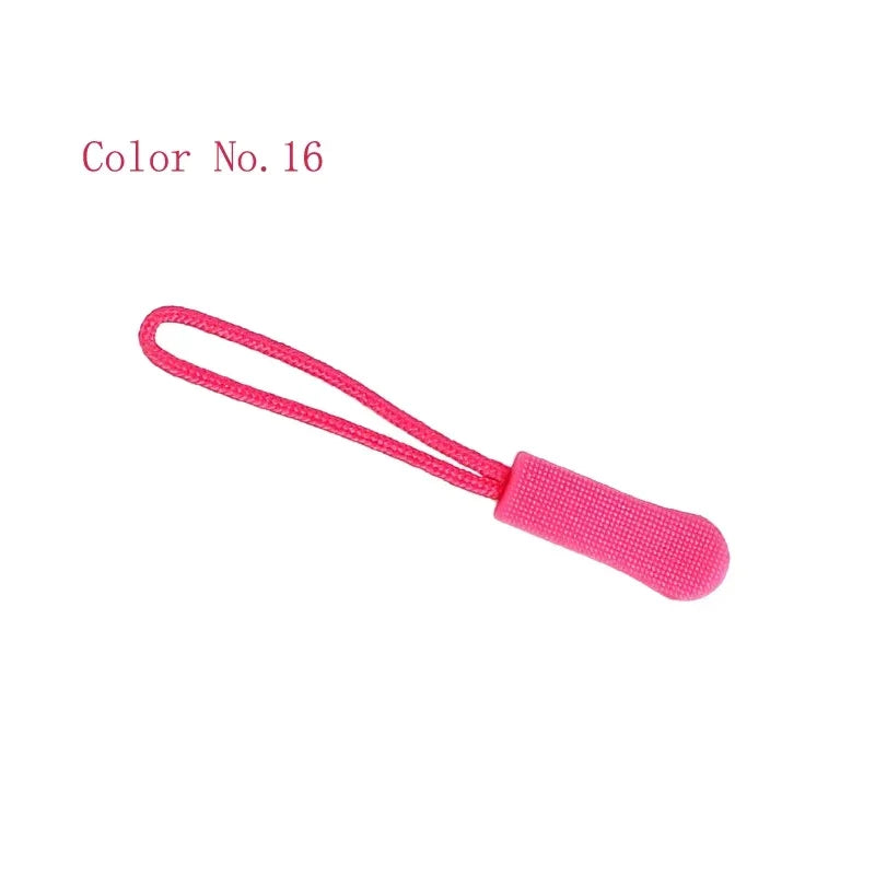A pink plastic zipper pull is shown against a white background.