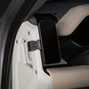 A magnetic car phone mount with a cup holder base is shown inside a vehicle door panel.