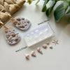 Silicone molds shaped like starfish and seashells for chocolates, candy, and fondant
