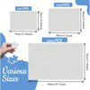 Various sizes of gray jigsaw puzzles featuring a repeating pattern for adults