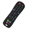 Black silicone baby teether toy shaped like a TV remote with various buttons and features