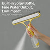 A hand holds a yellow squeegee with a built-in spray bottle, demonstrating its use for window cleaning.