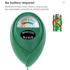 A green soil moisture meter with a needle indicating moist conditions, used for plant care.