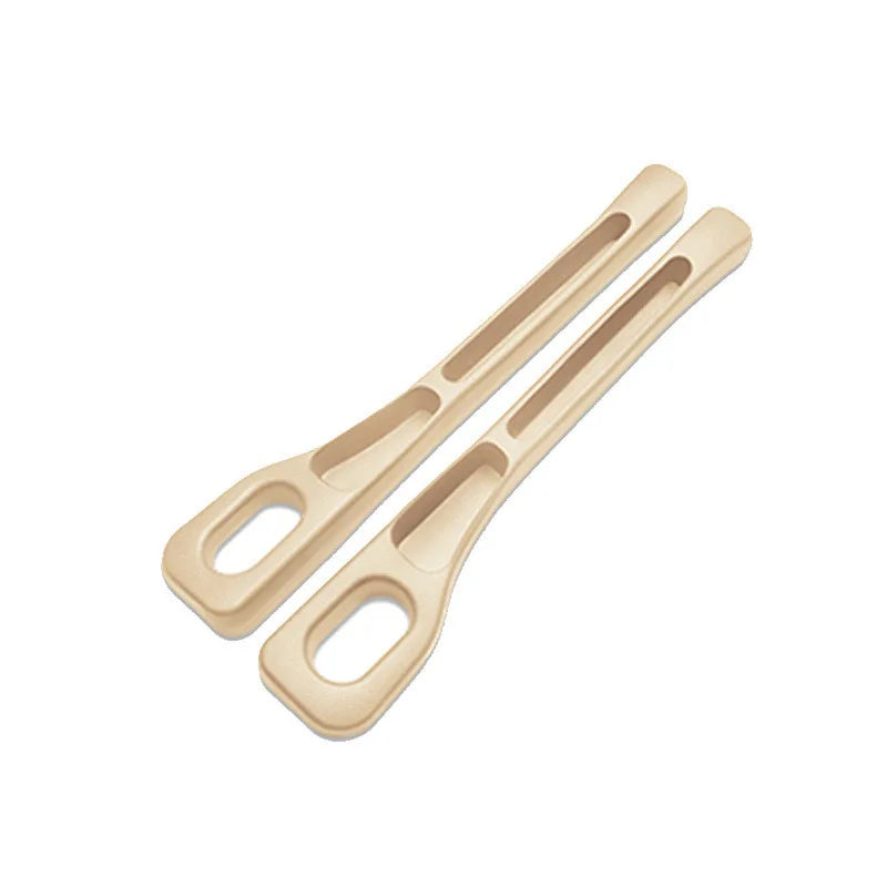 Two light beige car seat gap plug strips for preventing items from slipping between seats