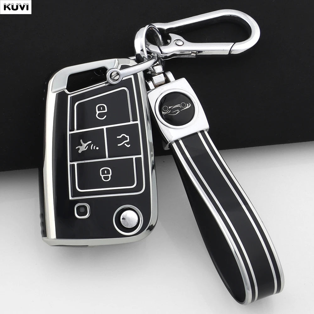 A black car key cover with a silver keychain attached, featuring a durable TPU material.