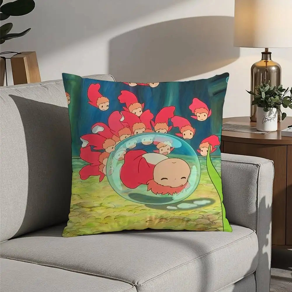 A colorful cartoon pillow featuring characters inspired by Ponyo, including fish and a sleeping figure.
