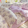 Lavender floral duvet cover set featuring purple and green floral patterns on a pink background