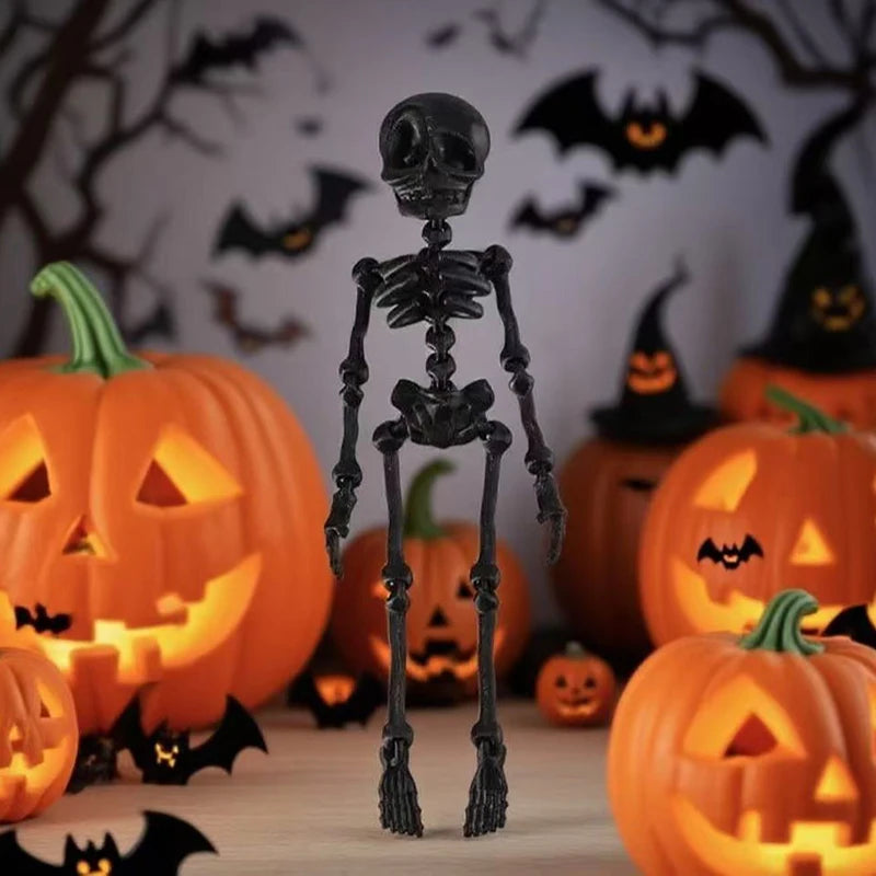 A black skeletal figure stands in front of glowing orange jack-o'-lanterns on a wooden surface.