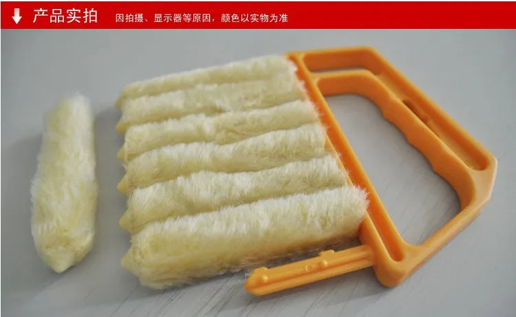 A yellow dusting brush with multiple white fibers is shown next to the product.