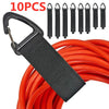 A black nylon cord organizer strap with a triangle buckle is shown next to a bundle of red electrical wire.