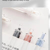 A close-up shot of five retractable gel pens with various colored ink, displayed on a white background.