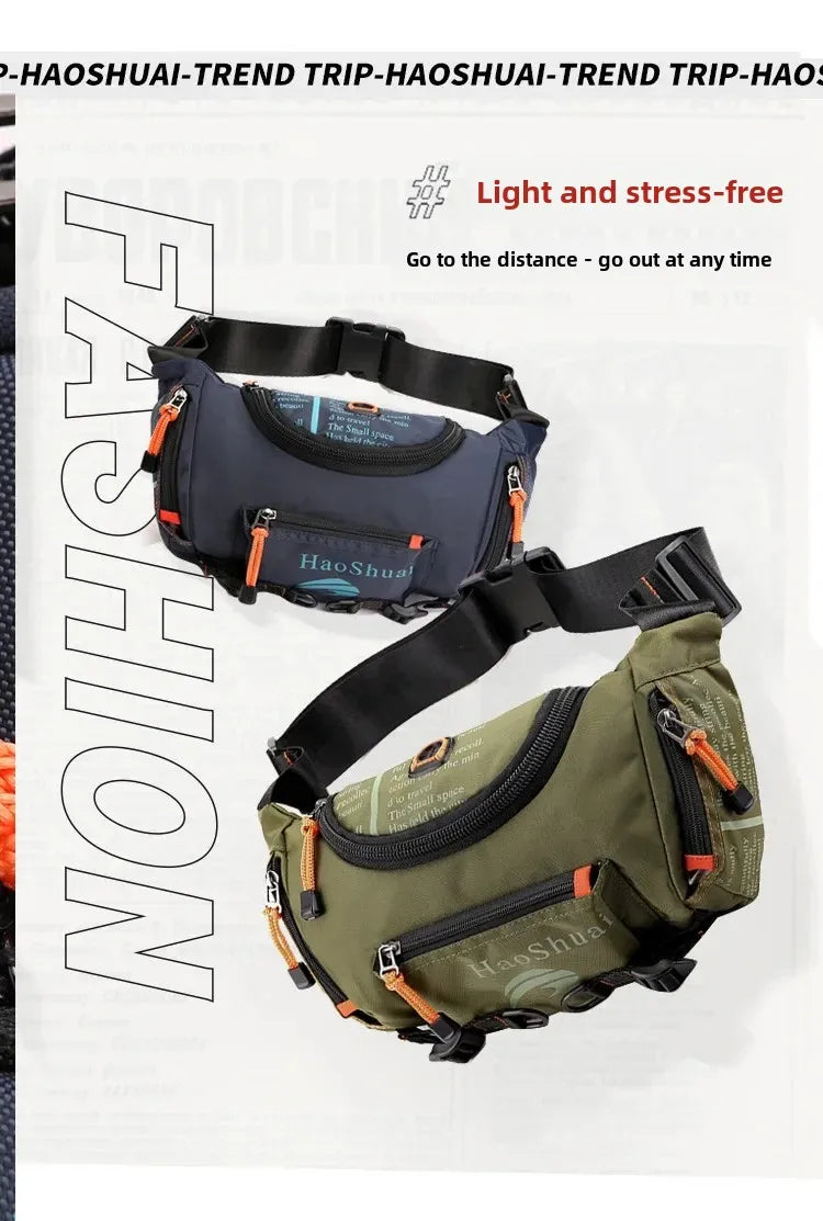 A dark blue tactical chest bag with an orange strap and pocket visible against a white background.