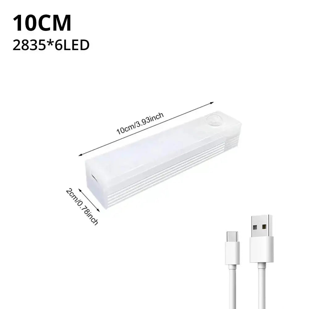 A white rechargeable motion sensor LED night light with a magnetic mount, shown in a profile view.