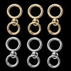 A set of round gold spring snap hooks and carabiners in zinc alloy for bags, keychains, and crafts.