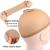 A beige breathable wig cap with a wide elastic band is shown on a mannequin head.