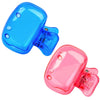 A pair of clear silicone toothbrush head covers in blue and pink with clips.