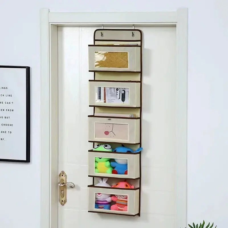 A vertical 5-shelf over-the-door hanging storage organizer with various compartments for small items.