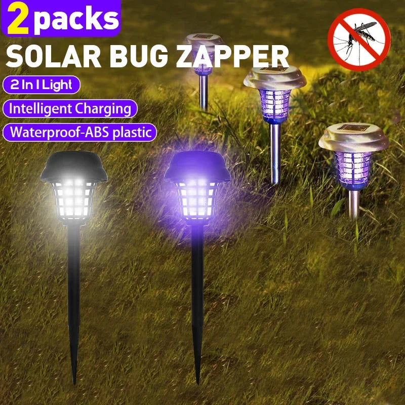 Deux packs de lampes d'électrocution solaire, dont un modèle noir et violet, dans un environnement extérieur herbeux.