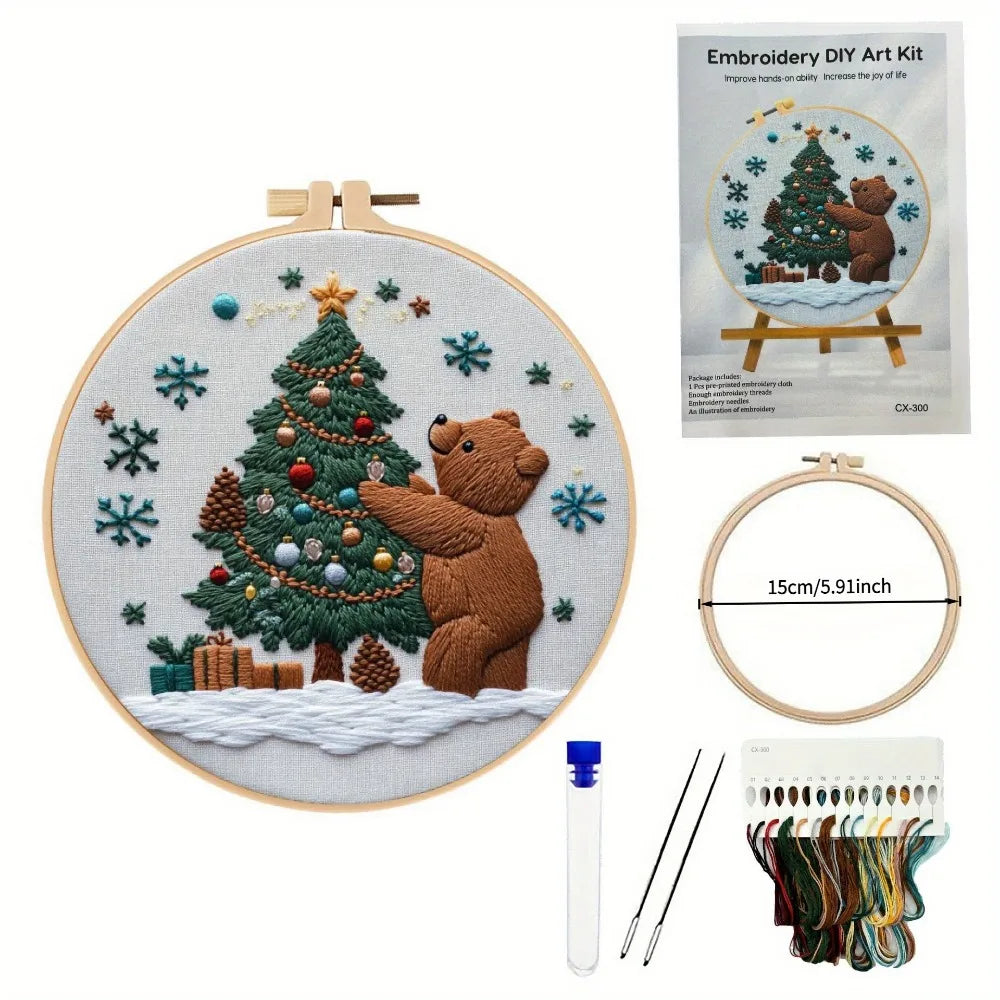 Embroidery DIY Art Kit featuring a hand-stitched Christmas tree with a bear and festive elements.
